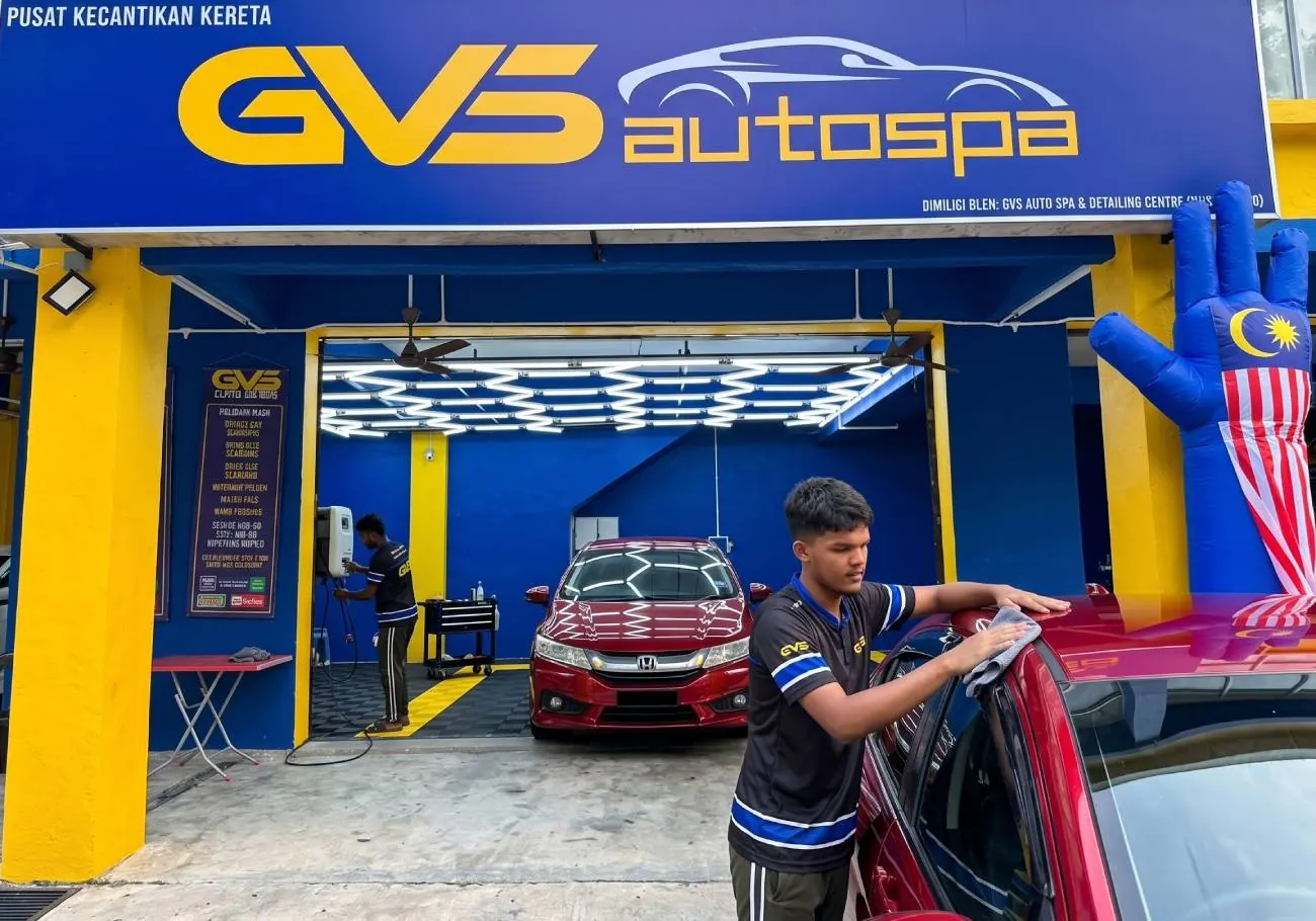 The GVS Autospa shopfront and signboard with crew working